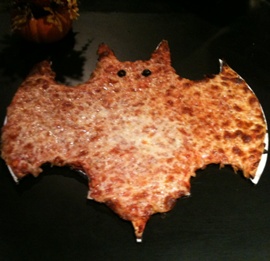 Father and Son Halloween bat pizza