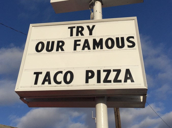 Try Our Famous Taco Pizza - Sign at Mickey & Bill's, 3102 Foltz, Mars Hill