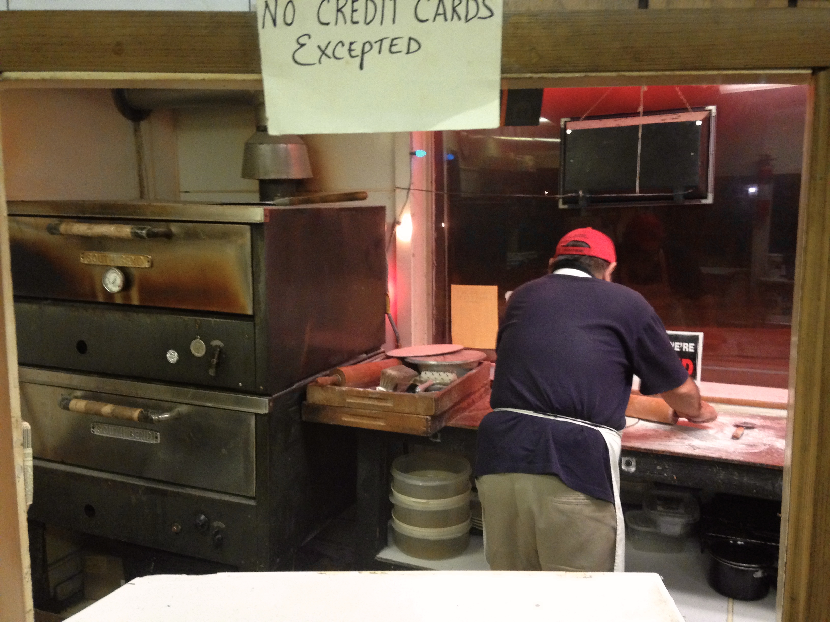 Sam Rizzo, Owner of Ono's Pizza, Rolling Dough in December 2014